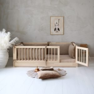 Natural wood toddler bed with rails